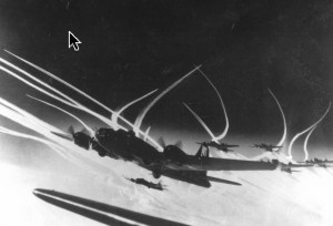 Contrails. The sharply curved ones are from the fighter escort.