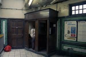 Wooden booths for the GPO's telephonic apparatus at Angel Tube. Not in an episode of Doctor Who, but in 1988. My Ray-Bans are just out of shot.